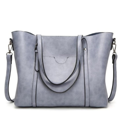Lucie™ - Bolsa Práctica Elegante
